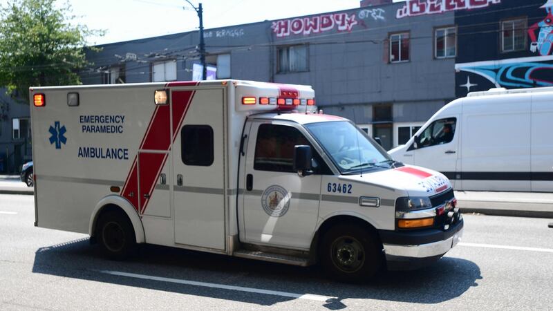 An ambulance  drivies through  Vancouver, British Columbia,   during west coast province’s record-smashing heatwave. Photograph: Don Mackinnon/AFP via Getty Images
