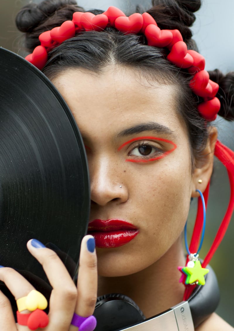 Freedom to Choose: DJ head wrap in red acrylic hearts on sports lace (€99), rainbow hoops (€65), Love Cuff rings 3D Digital (€50)