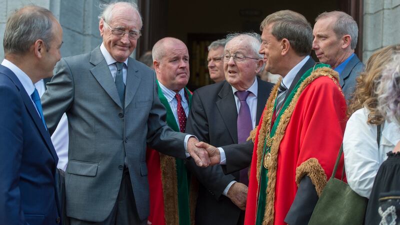 Frank Duggan (“Cha”) with Fianna Fáil  leader Micheál Martin TD, actor Bill O’Connell and Lord Mayor of Cork Cllr Tony Fitzgerald at the funeral of actor Michael Twomey. Photograph: Michael Mac Sweeney/Provision