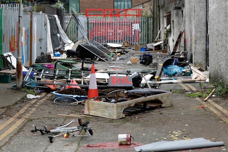The burnt remains of an encampment used by refugees at Sandwith Street, Dublin, which was set alight following protests in the area. Photograph: Conor Ó Mearáin/Collins Photo Agency