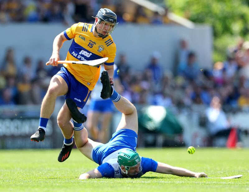 Waterford’s Jack Prendergast and David Reidy of Clare during their Munster Senior Hurling Championship clash. Photograph: James Crombie/Inpho