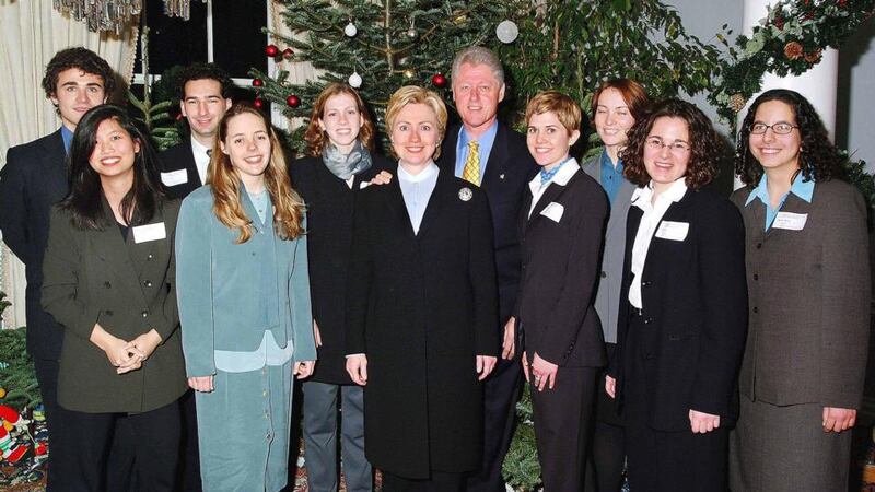 Li (far left) with former US president and first lady Bill and Hillary Clinton and a group of fellow George Mitchell Scholars studying in Ireland