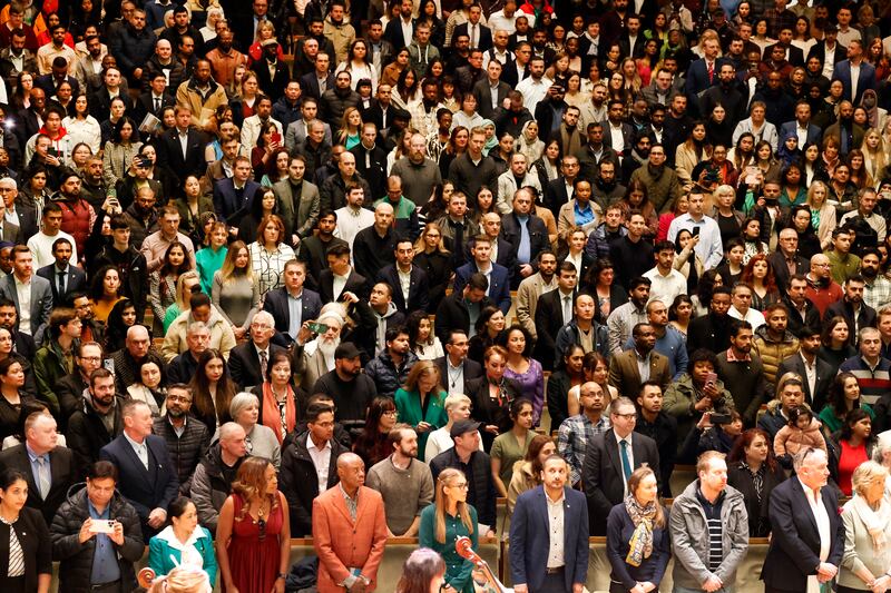 Céad míle fáilte. More than 1,200 people were conferred with Irish citizenship across two ceremonies at the National Concert Hall in Dublin on Monday. Photograph: Nick Bradshaw
