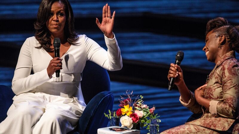 Michelle Obama with Nigerian author Chimamanda Ngozi Adichie at The Royal Festival Hall on Monday.  Photograph: Jack Taylor/Getty Images