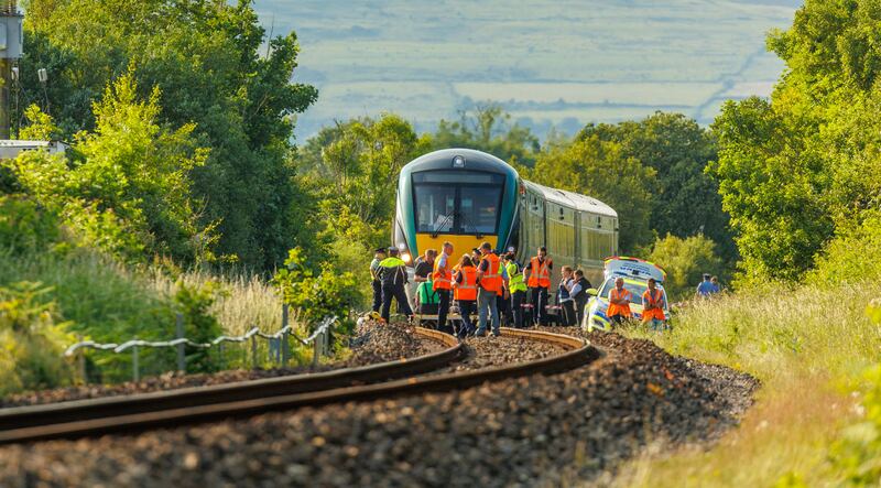 Emergency services at the scene of the train incident in Sligo on Wednesday. About 100 passengers were on board the train, halted between Ballisodare and Collooney. Photograph: James Connolly