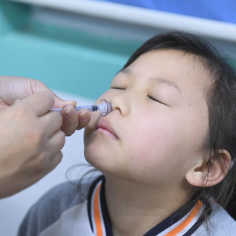 A mucosal spray version of the flu vaccine being administered earlier this year. Photograph: Wang Biao/VCG via Getty