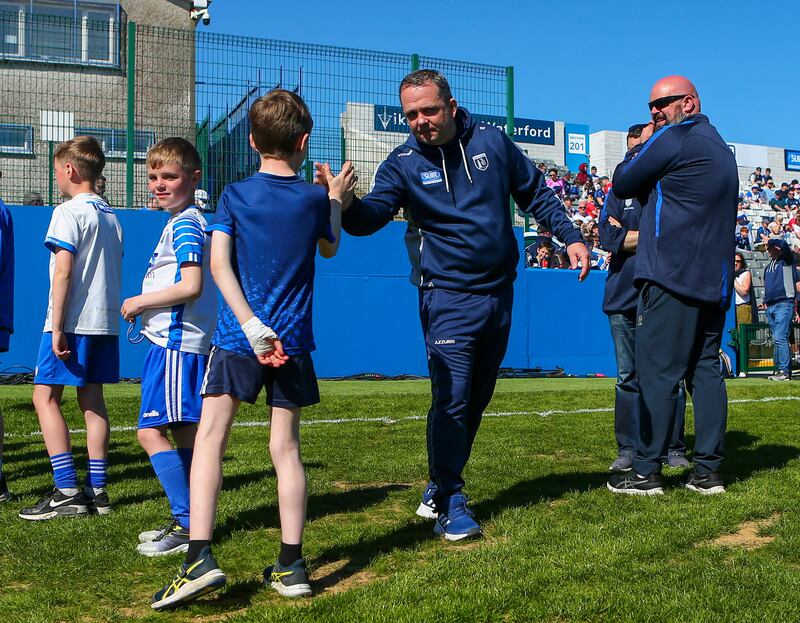 Davy Fitzgerald greets mascots from Waterford’s primary games before the game. Photograph: Ken Sutton/Inpho