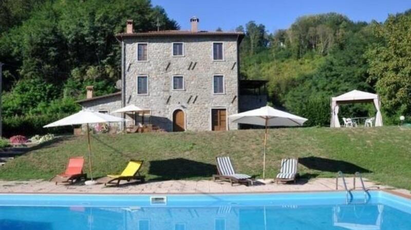 This three-storey farmhouse Italian farmhouse comes with sweeping views of Tuscany