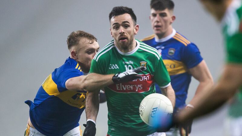 Mayo’s Kevin McLoughlin with Kevin Fahey of Tipperary in the  All-Ireland SFC semi-final at Croke Park on December 6th. Photograph: Morgan Treacy/Inpho