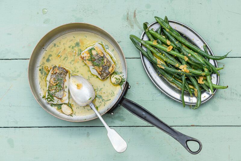 Roast hake in garlic butter with French beans