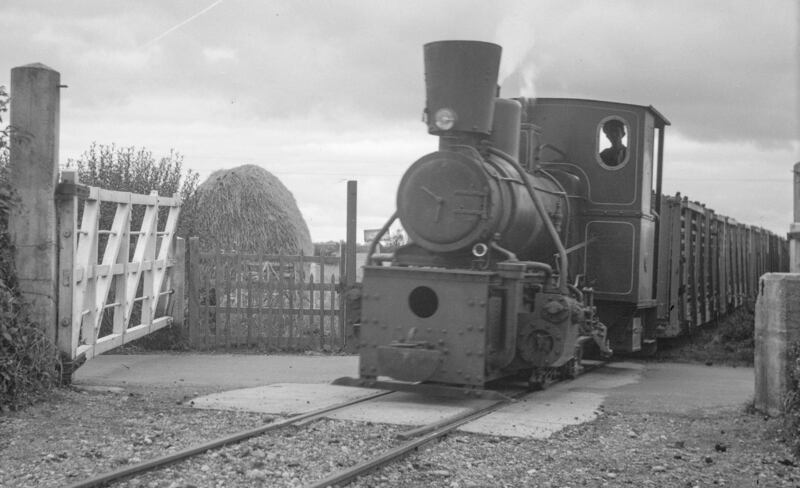 No 2 hauls a fully-loaded turf train through a road crossing at Cushina, Co Laois on September 26th, 1958. Note the electric headlight at the front of the chimney, a very modern fitting for its day. Photograph: Robin N Clements/ Irish Railway Record Society Archive