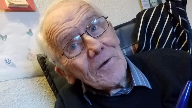 Dónal keeps an eye on Kerry as she works on her Irish at his home in Limerick.