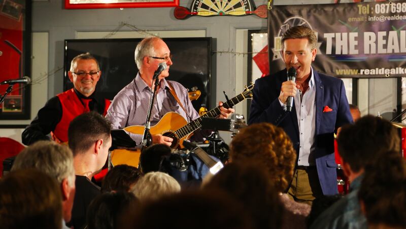 Daniel singing with The Real Deal at the Stretford Inn Causeway