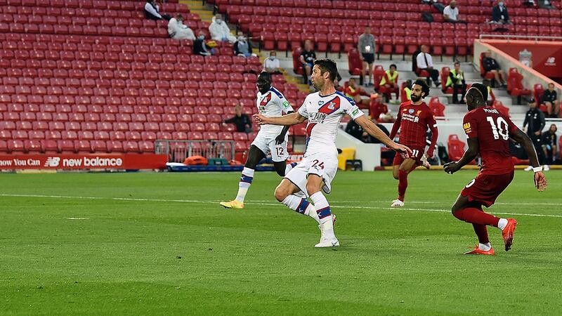 Sadio Mane scores against Crystal Palace on Wednesday. Photo: Andrew Powell/Liverpool FC via Getty Images