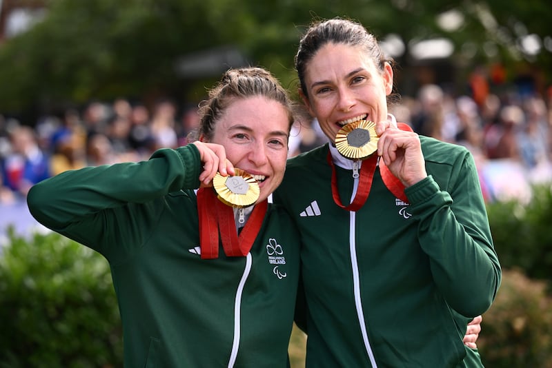 Linda Kelly and Katie-George Dunlevy celebrate with their gold medals. Photograph: Ramsey Cardy/Sportsfile