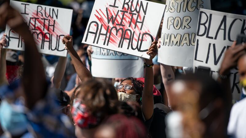Demonstrators protest at the shooting dead of Ahmaud Arbery at the Glynn County courthouse in Brunswick, Georgia in May. Photograph: Sean Rayford/Getty Images
