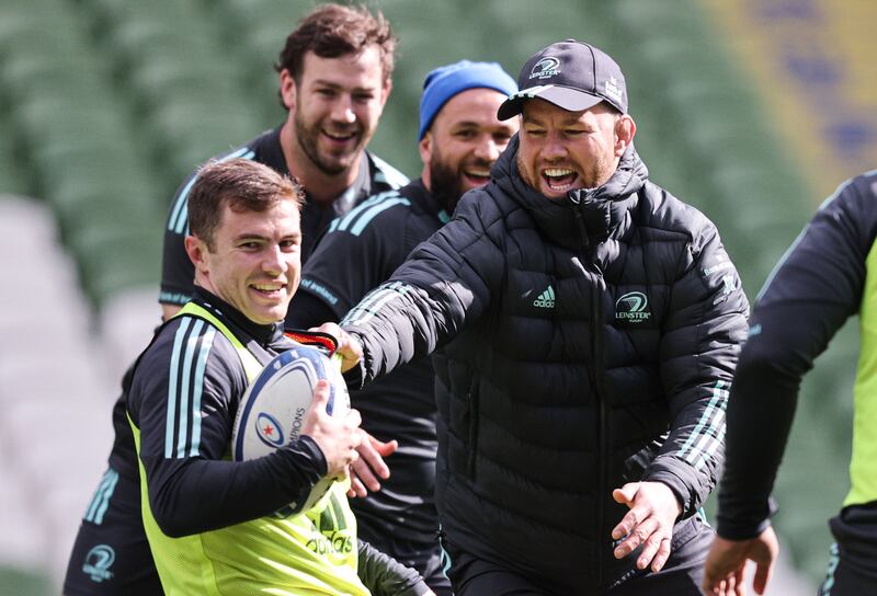 Leinster's Luke McGrath and contact skills coach Seán O’Brien share a laugh during preparations at the Aviva Stadium. Photograph: Tom Maher/Inpho