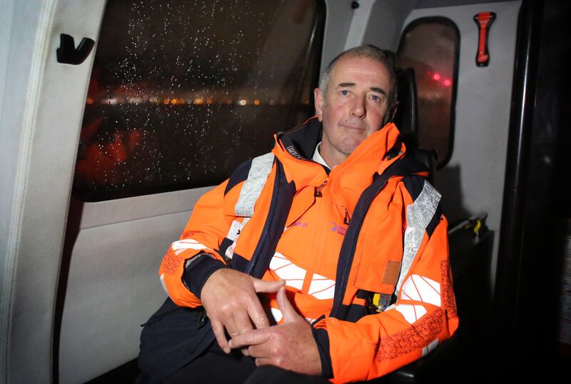 Captain Colm Newport aboard a pilot vessel in Dublin Bay as he is brought out to sea to pilot an incoming vessel. Photograph: Bryan O'Brien
