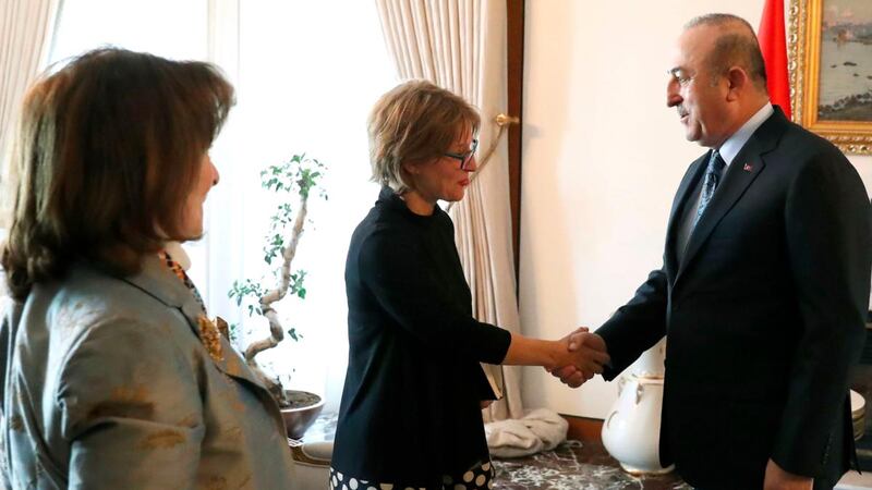 Turkish foreign minister Mevlut Cavusoglu shaking hands with UN special rapporteur Agnes Callamard in Ankara on January 28th. Photograph: Cem Ozdel/Turkish Foreigner Ministry/AFP/Getty Images