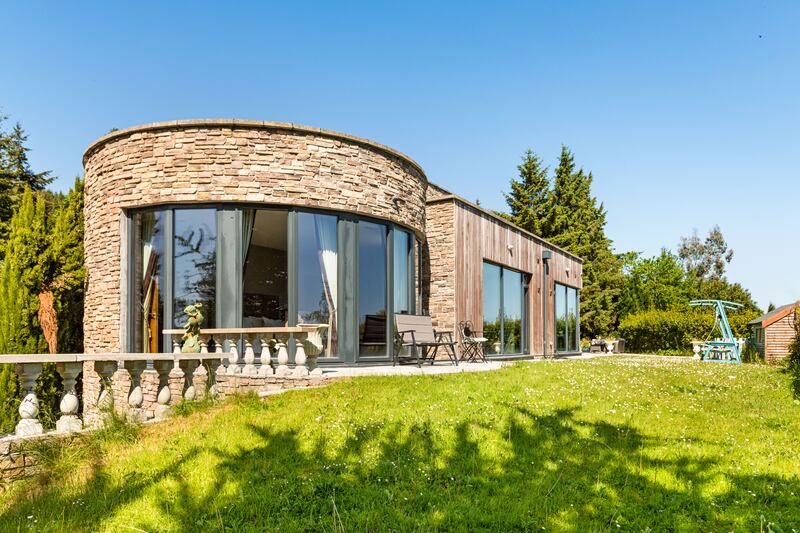 The property has a distinctive cut-stone facade