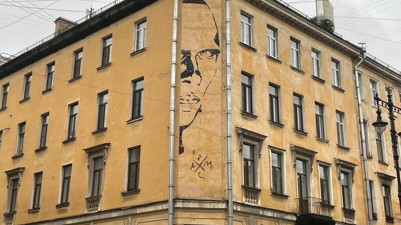 A mural of Soviet writer Daniil Kharms on the building where he lived until 1941 in Saint Petersburg. City officials want the unauthorised portrait to be erased. Photograph: Daniel McLaughlin