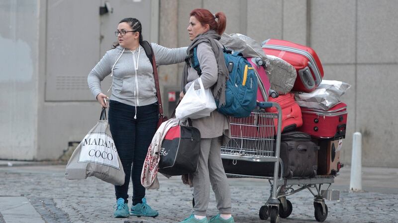 Tourists stand with their belongings as they leave their hotels after Saturday’s bombing in Istanbul. Photograph: Deniz Toprak/EPA