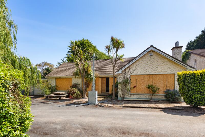 Claddagh on a 0.55-acre site surrounded by mature trees and hedging