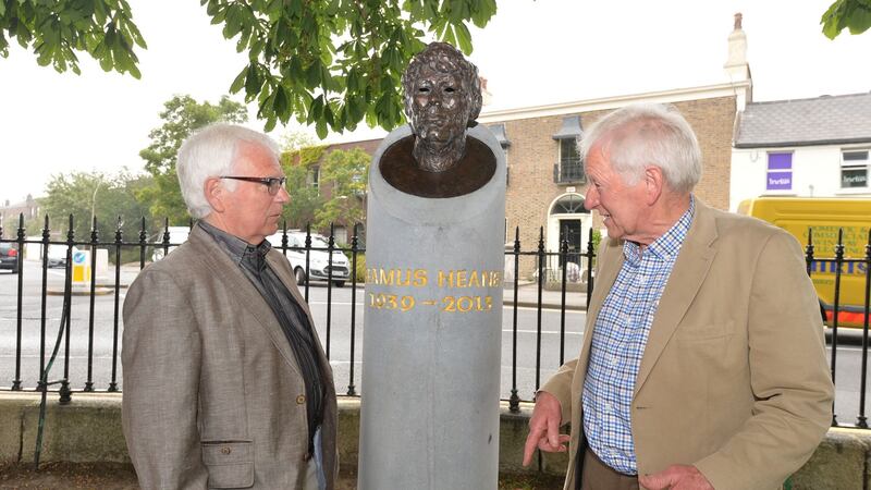 Dan and Hugh Heaney, brothers of Seamus Heaney, at the unveiling of a bust of the poet by sculptor Carolyn Mullholland in Sandymount Green. Photograph: Alan Betson