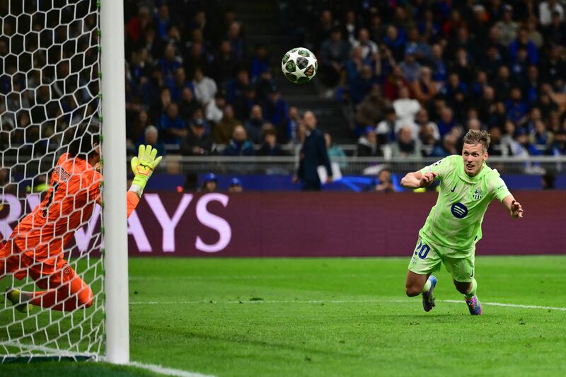 Daniel Olmo heads home Barcelona's equaliser for 5-5, with the away team now dominating. Photograph: Marco Bertorello/AFP