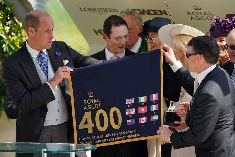 The Prince of Wales presents Aidan O'Brien with an award for training his 400th career flat Group or Grade One winner after winning the Prince Of Wales's Stakes with Auguste Rodin at Royal Ascot. Photograph: Jonathan Brady/PA Wire