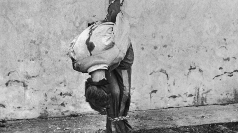 Total war: a German soldier executed by an American firing squad during the Battle of the Bulge in December 1944. Photograph: John Florea/Time Life/Getty