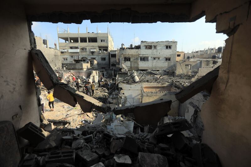 The aftermath of an Israeli air strike on Khan Younis. Photograph: Yousef Masoud/The New York Times
                      