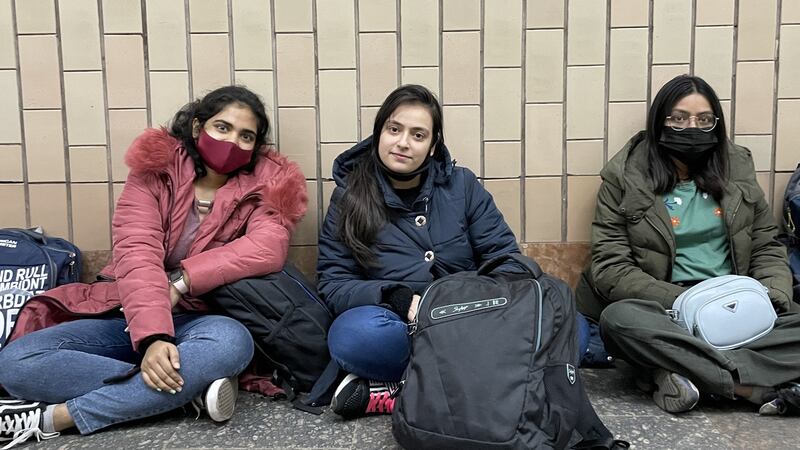 Jasmine, Swati and Puja, three of thousands of Indians studying in Kharkiv in eastern Ukraine, shelter from possible Russian shell and missile fire in a metro station in Kharkiv in eastern Ukraine.