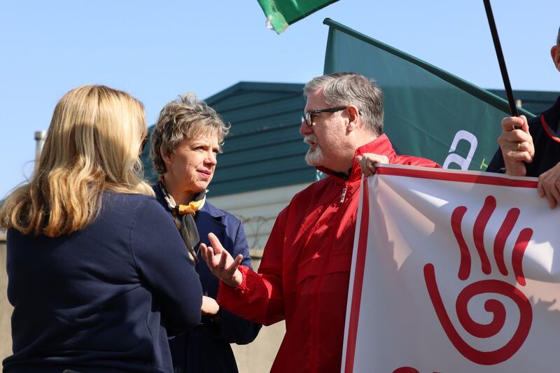 Labour leader Ivana Bacik (centre) speaks to Jim McVeigh at Dublin Port as Siptu members demonstrate their support for the 800 P&O Ferries workers who were sacked without notice last week. Photograph: Dara Mac Dónaill/The Irish Times