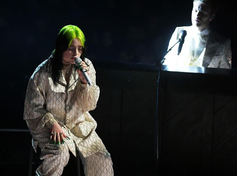 Billie Eilish and her brother Finneas O’Connell performing at the Grammy awards on Sunday in Los Angeles. Photograph:   Kevin Winter/Getty Images