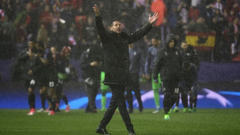 Simeone thanks the Atletico fans after the match. Photo: Pierre Phillip-Marcou/Getty Images