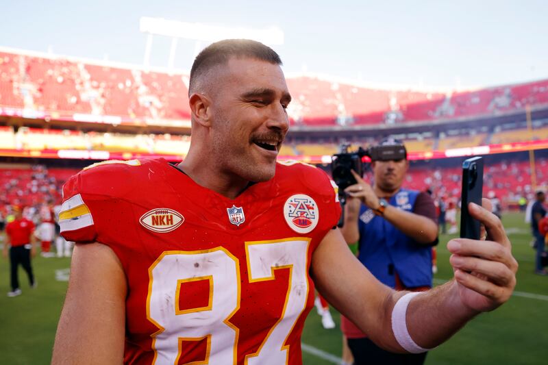 Kansas City Chiefs's Travis Kelce's relationship with Taylor Swift is a windfall for him in terms of soaring jersey sales, podcast audience and demand for appearances and ads. Photograph: David Eulitt/Getty Images