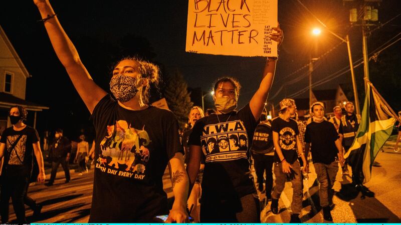 Protesters in Kenosha, Wisconsin on Wednesday night. Photograph:   Brandon Bell/Getty Images