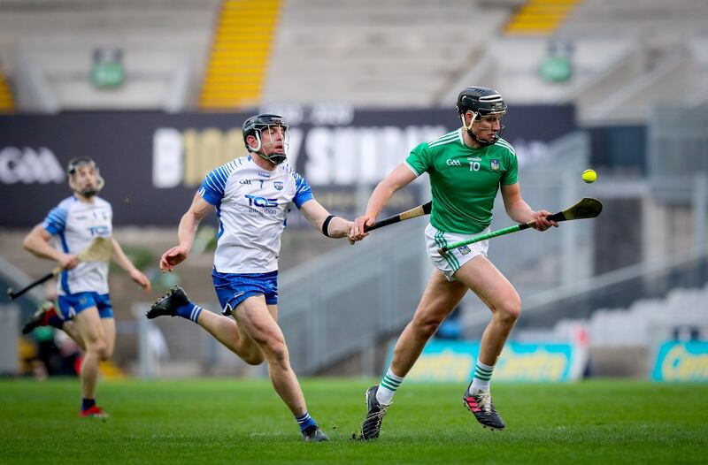 Man of the match Gearóid Hegarty gets a run on Kevin Moean. Photo: Ryan Byrne