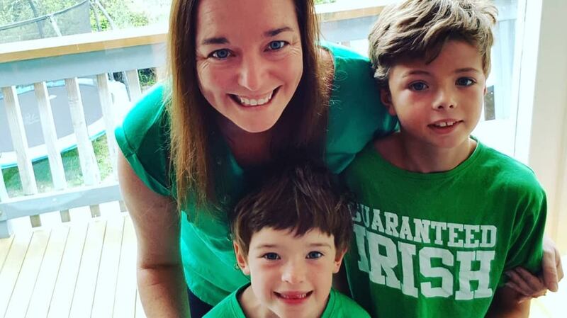 Linda de Paor with her sons Luca and Eli at home in Cass Bay  on St Patricks Day, 2018.