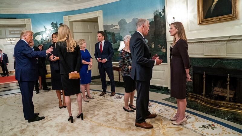 US president Donald Trump and his supreme court nominee Amy Coney Barrett talk to guests including first lady Melania Trump at a White House reception on  Sept. 26th. Photograph: Doug Mills/New York Times