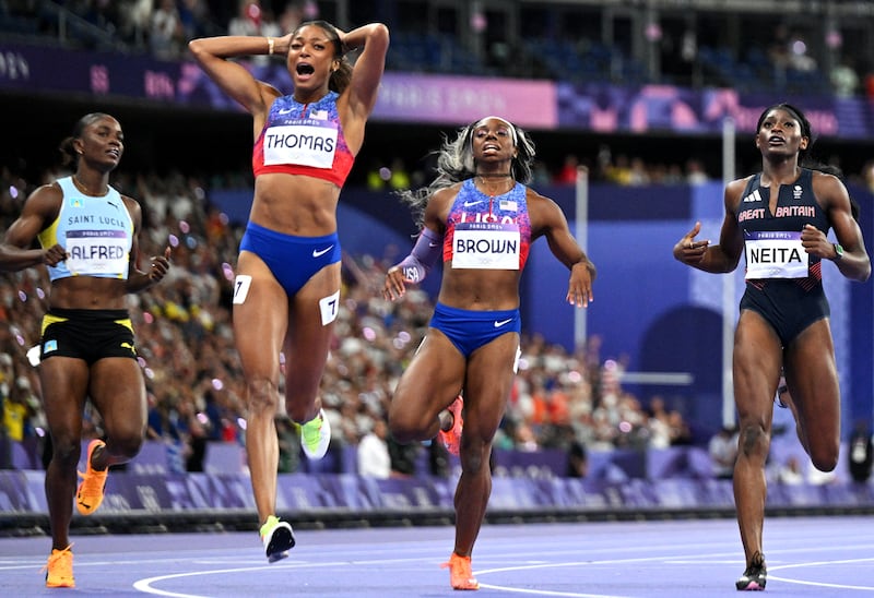 Gabrielle Thomas of the USA celebrates winning the women's 200m final in front of St Lucia's Julien Alfred, Brittany Brown of the USA and Britain's Daryll Neita. Photograph: Jewel Samad/AFP via Getty Images