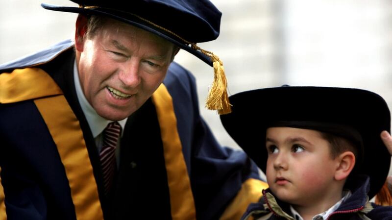 Micheál Ó Muircheartaigh  after being  awarded an honorary doctorate of law by the Higher Education and Training Awards Council, pictured with his grandson Leonidas Kalaitzidis (4) at the National Gallery in 2006. Photograph: Eric Luke