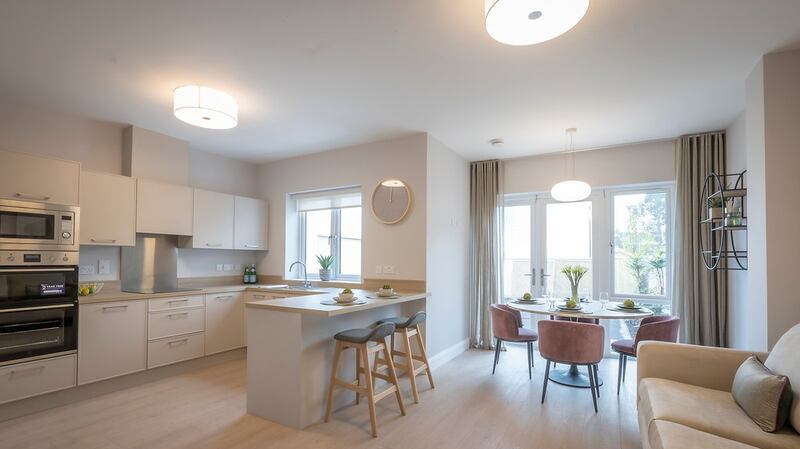 Kitchen and living area in three-bed  homes.