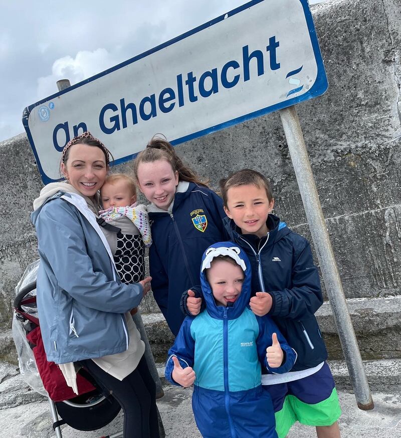Tara Dunne-Uí Admhaill with her children Aoibhí (13), Oscar (9), Lughaidh (6) and Léana (2). 'There was no question whether we would raise our child in Irish, it came very naturally to us'