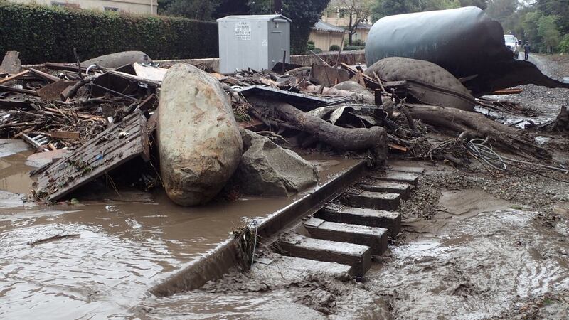 A section of the Union Pacific Railroad is blocked by mudflow and debris after a mudslide in Montecito. Photograph: Mike Eliason/Santa Barbara County Fire Department/Reuters