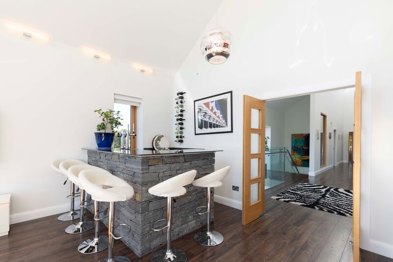 Cut-stone home bar is ideal for entertaining