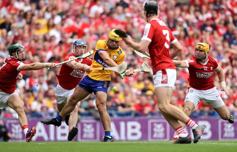 Mark Rodgers of Clare scores a terrific goal against Cork. Photograph: Bryan Keane/Inpho