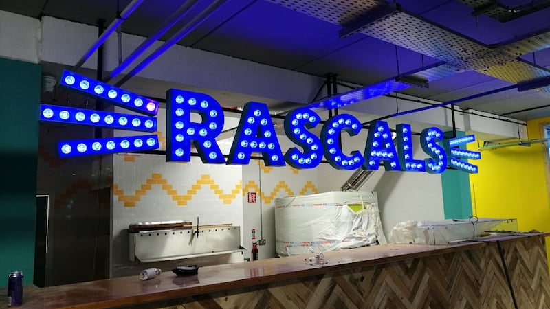 Bright new signage goes up above the pizza bar inside Rascals new Dublin 8 home