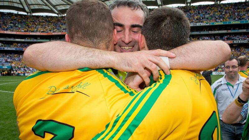 Jim McGuinness celebrates Donegal’s win over Dublin in the All-Ireland SFC semi-final in Croke Park in 2014 with  Neil McGee and Eamon McGee. Photograph: Morgan Treacy/Inpho